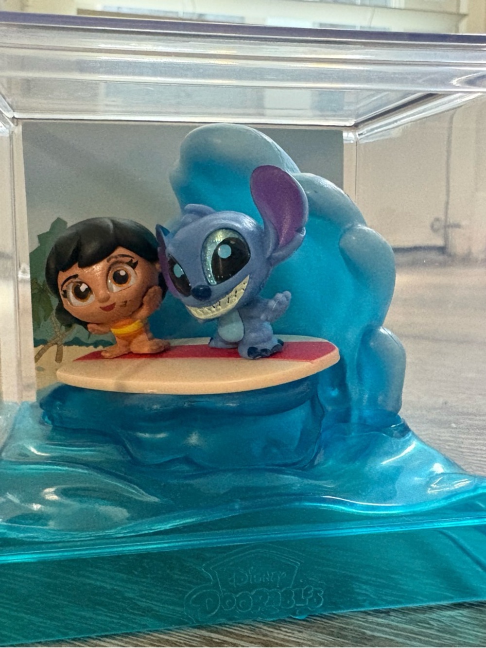 Disney Lilo & Stitch Surfing Wave Figurine in Bright Blue